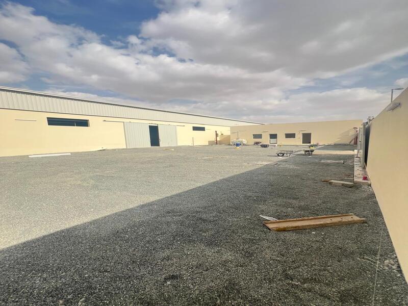 Warehouse for sale in Al Sajaa area, land area 27,000 square feet