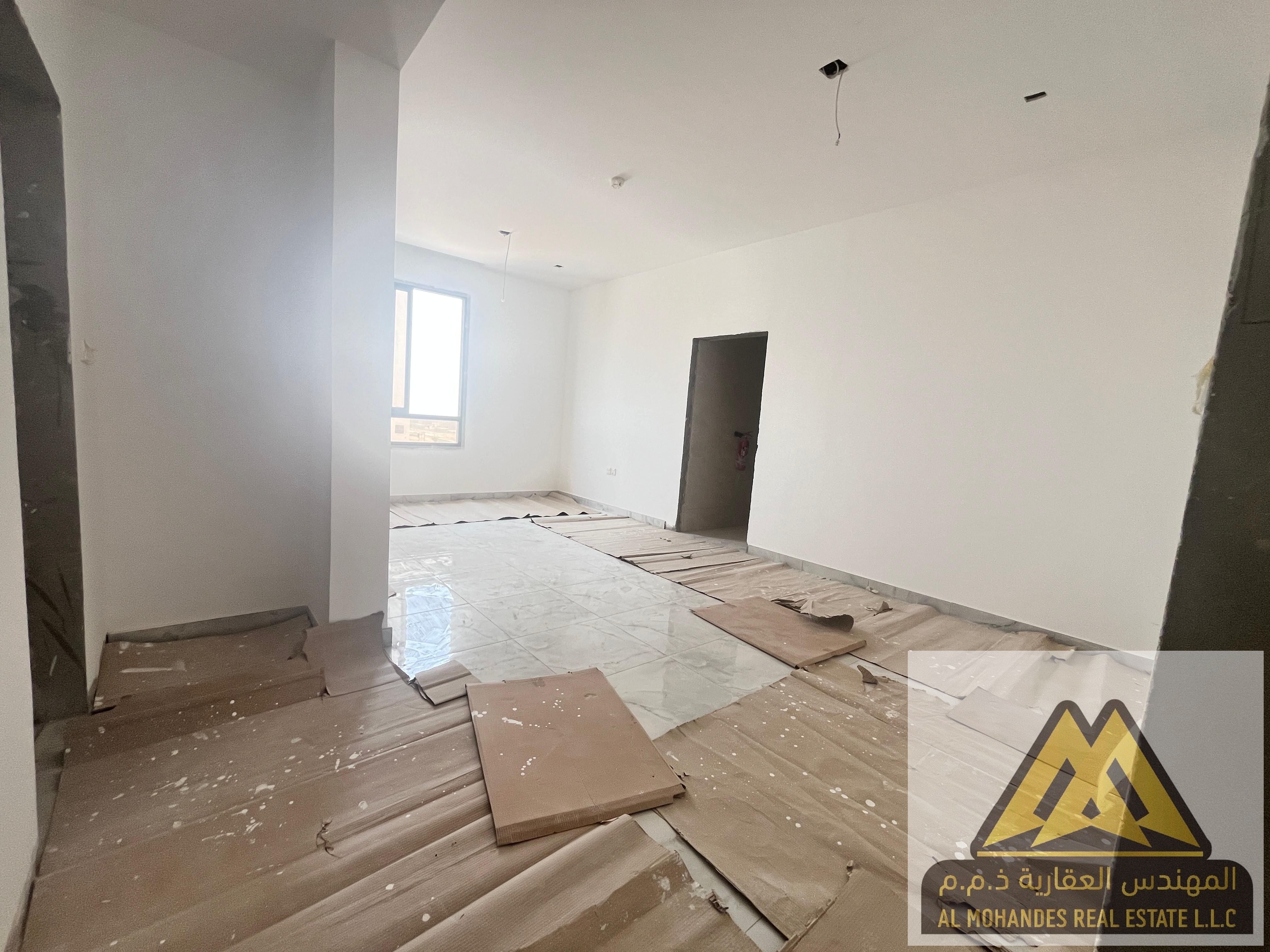 Studio for annual rent in Al Bahia Ajman 400 sq ft in a neat building quiet location close to services for 23000 dirhams with flexible payments and ch