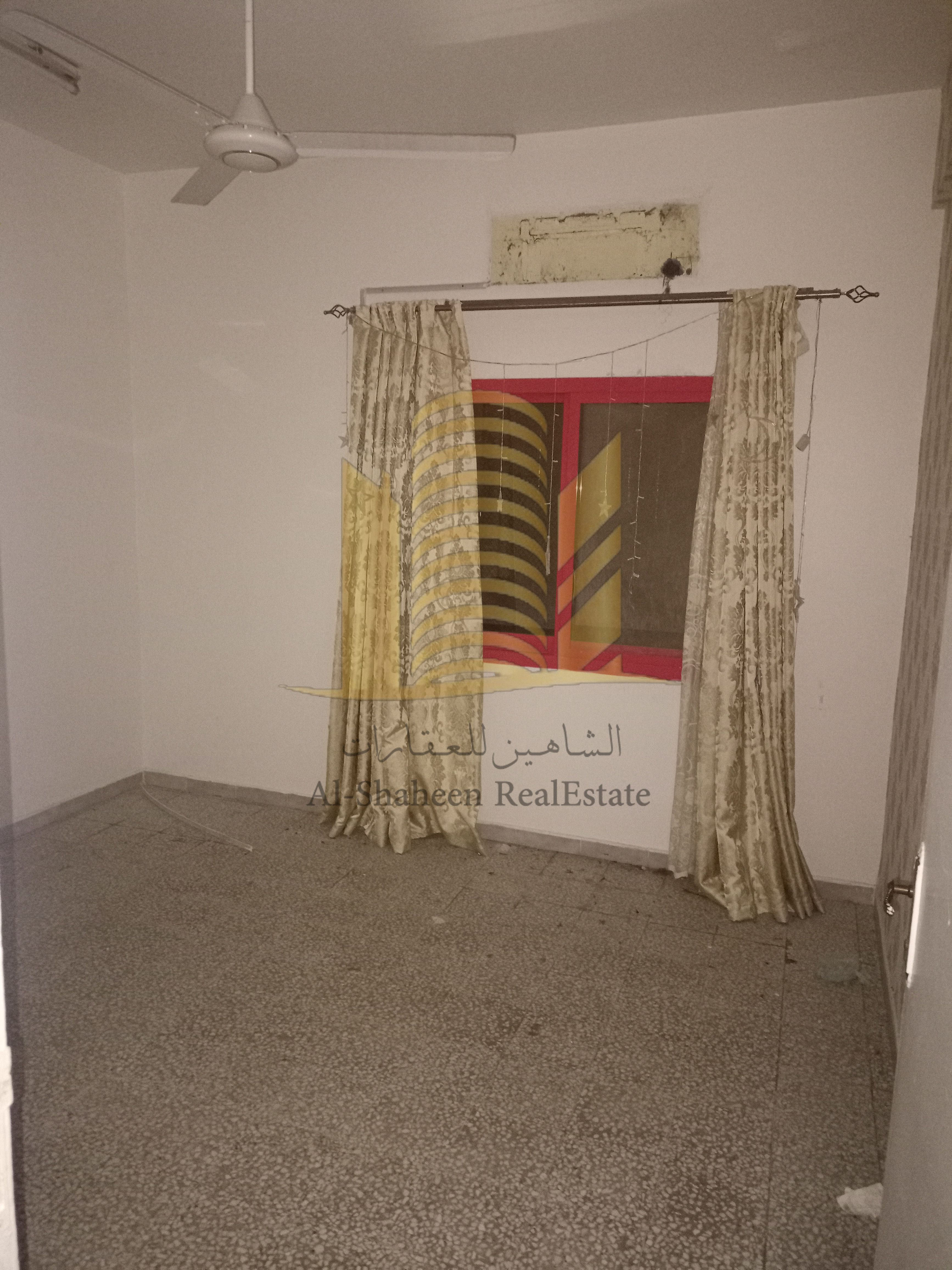 Two-bedroom apartment with a living room for annual rent in Sharjah, Yarmouk area.