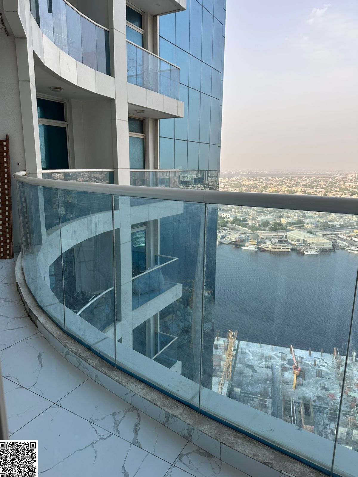 One bedroom and living room with two bathrooms and a balcony. Spacious with a full creek view. In Al Waha Towers, Tower 2, Al Rashidiya 1