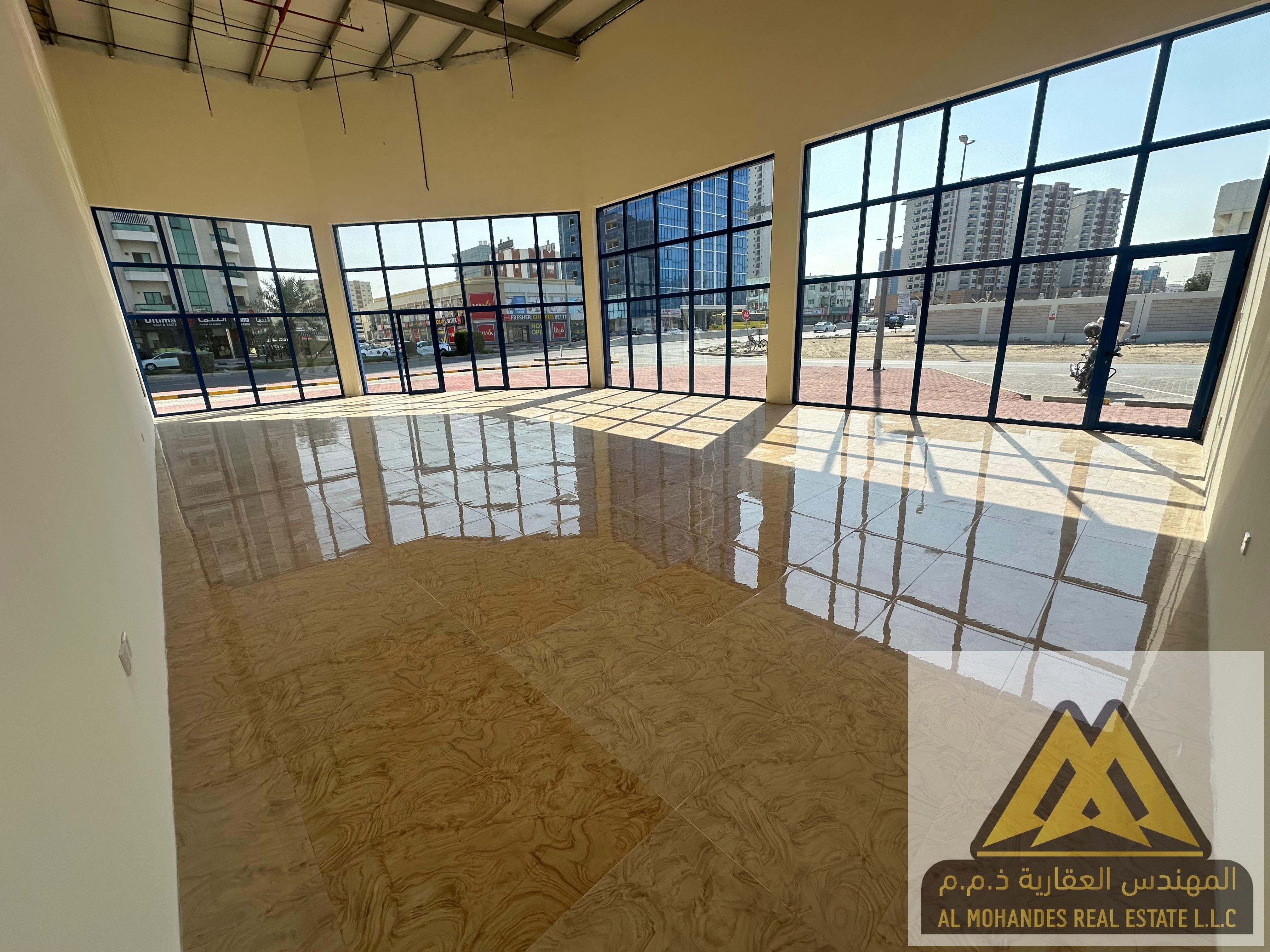 Corner Shop for Rent in Musheiref, Ajman | 1,560 sq. ft. | Modern Commercial Complex | Prime Location | AED 250,000 Annually