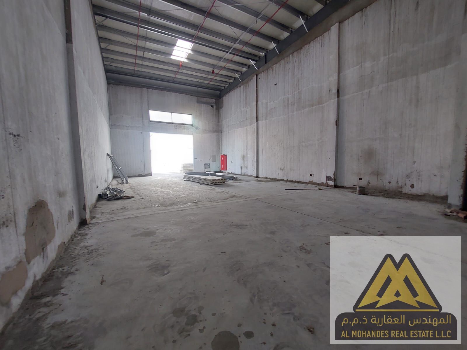 New ground‑floor warehouse for annual rent in Al Jurf Industrial 3 Ajman 2153 sq ft with bathroom 25 kW power suitable for all activities in a strateg