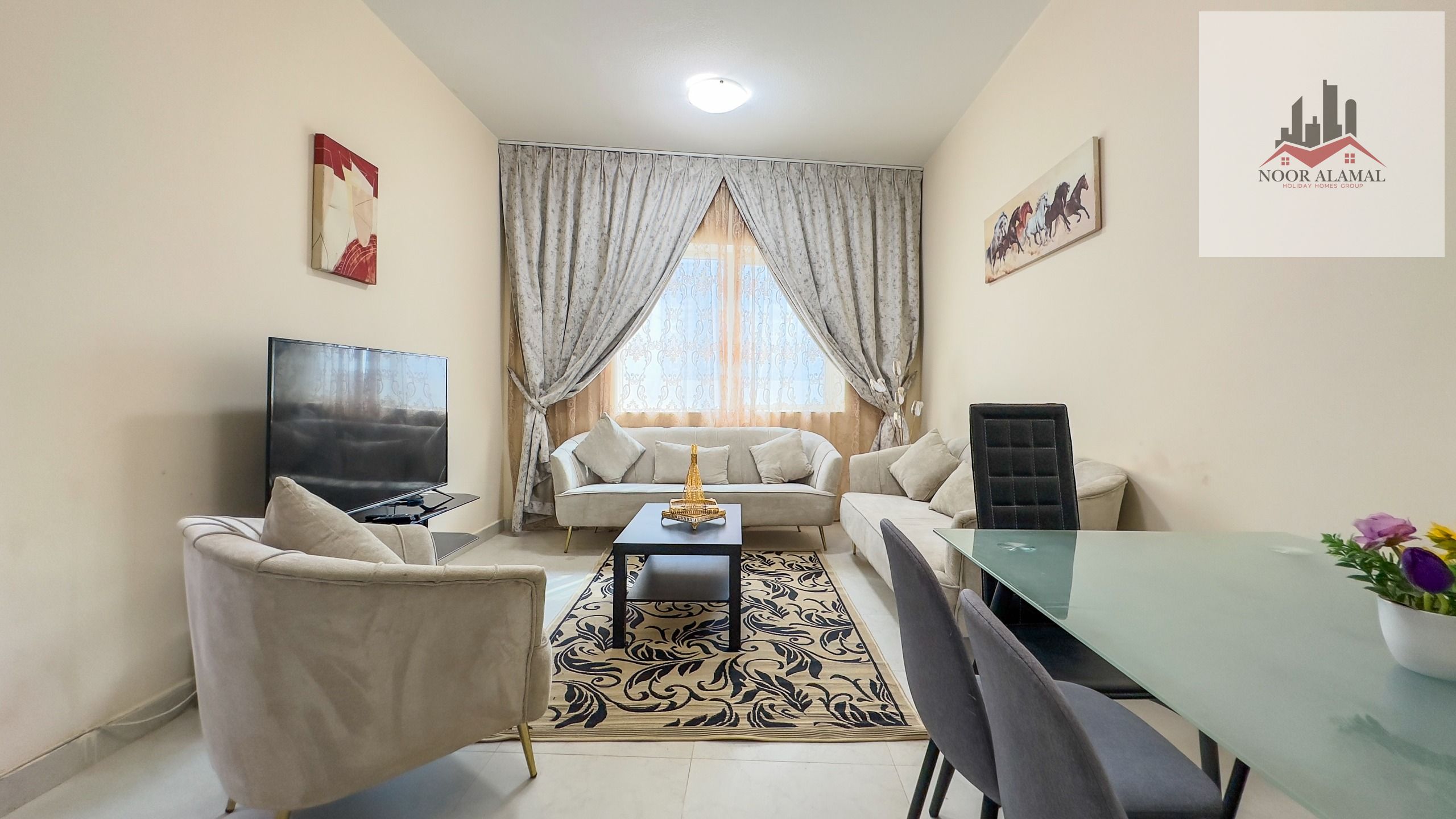 Sharjah, Al Taawun area, furnished apartment with hotel-style furnishings, one bedroom, living room, kitchen, and two bathrooms