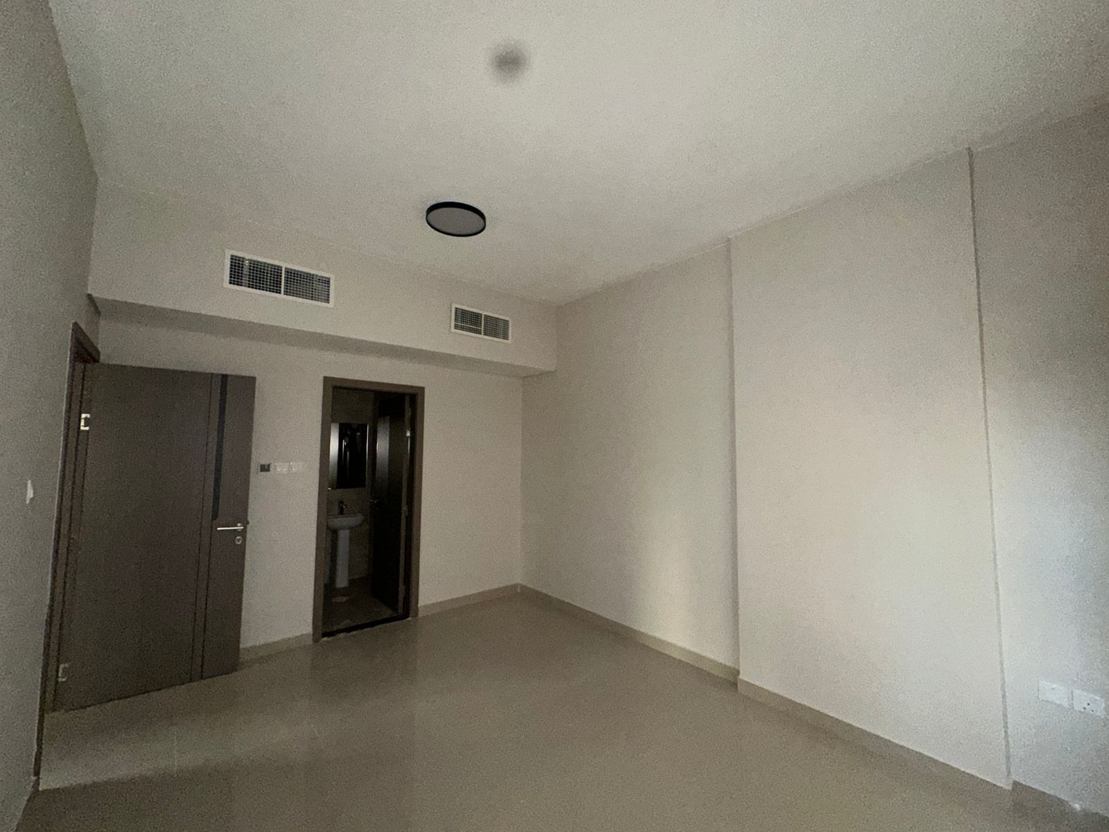 Two bedrooms and a separate living room in Al Nuaimiya 1 on Al Ittihad Street, next to Emirates Markets, near the Dubai exit. Payment in 4 installment