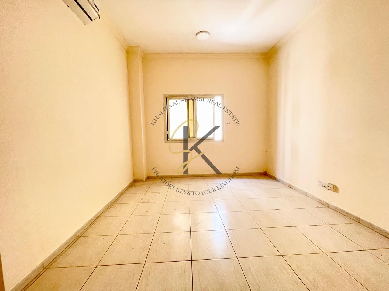Spacious Unfurnished 2 BHK Apartment with 2 Washrooms for Rent in Muwailah, Sharjah | 1300 Sqft | All Amenities Included