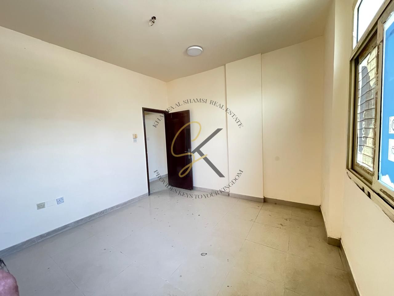 Spacious Unfurnished 2 BHK Apartment with 2 Washrooms for Rent in Muwailah, Sharjah | 1300 Sqft | All Amenities Included