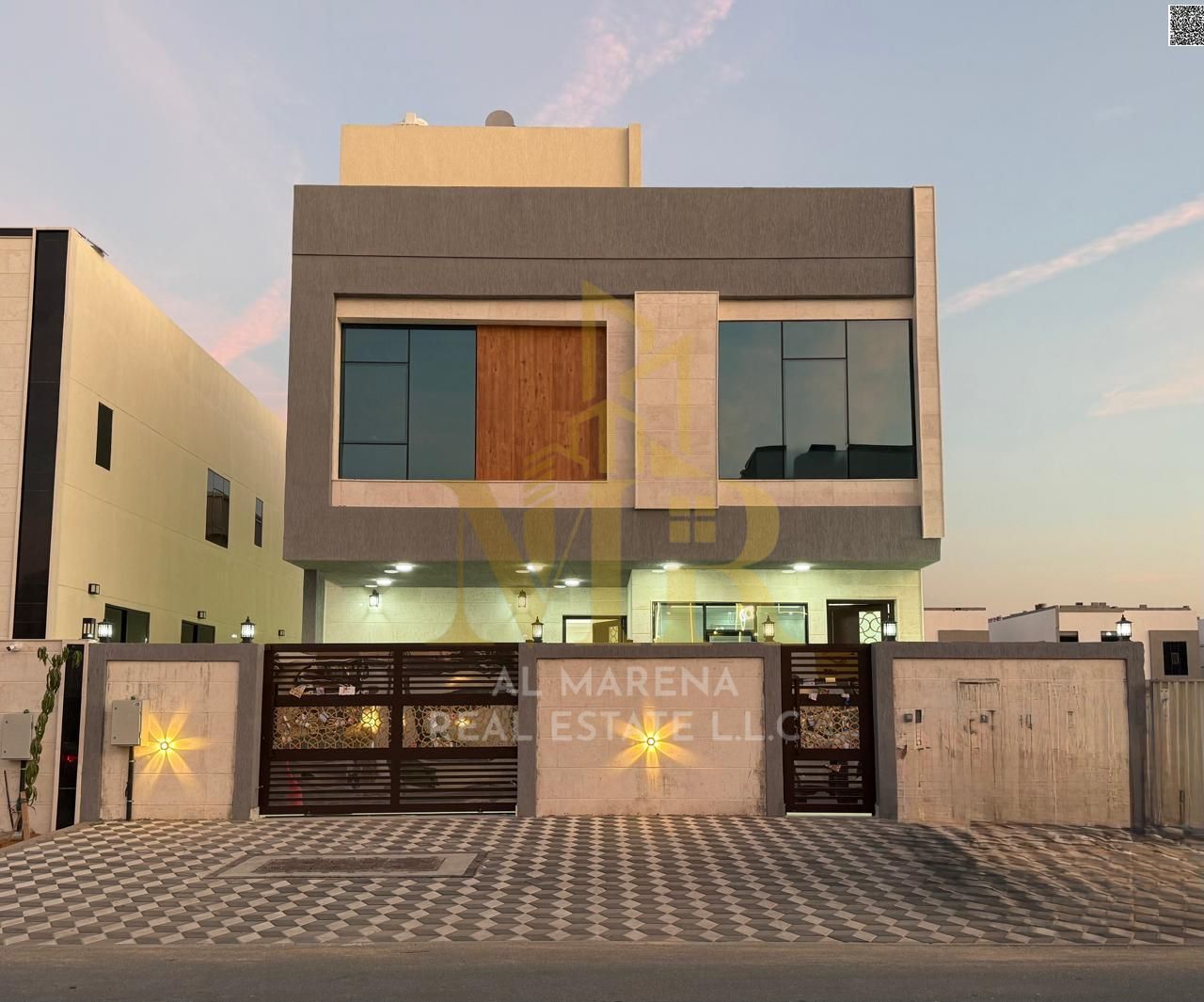 Turnkey villa, all-inclusive (registration fees, electricity, water, and air conditioning), on the main street, ready to move in, in one of Ajman's mo