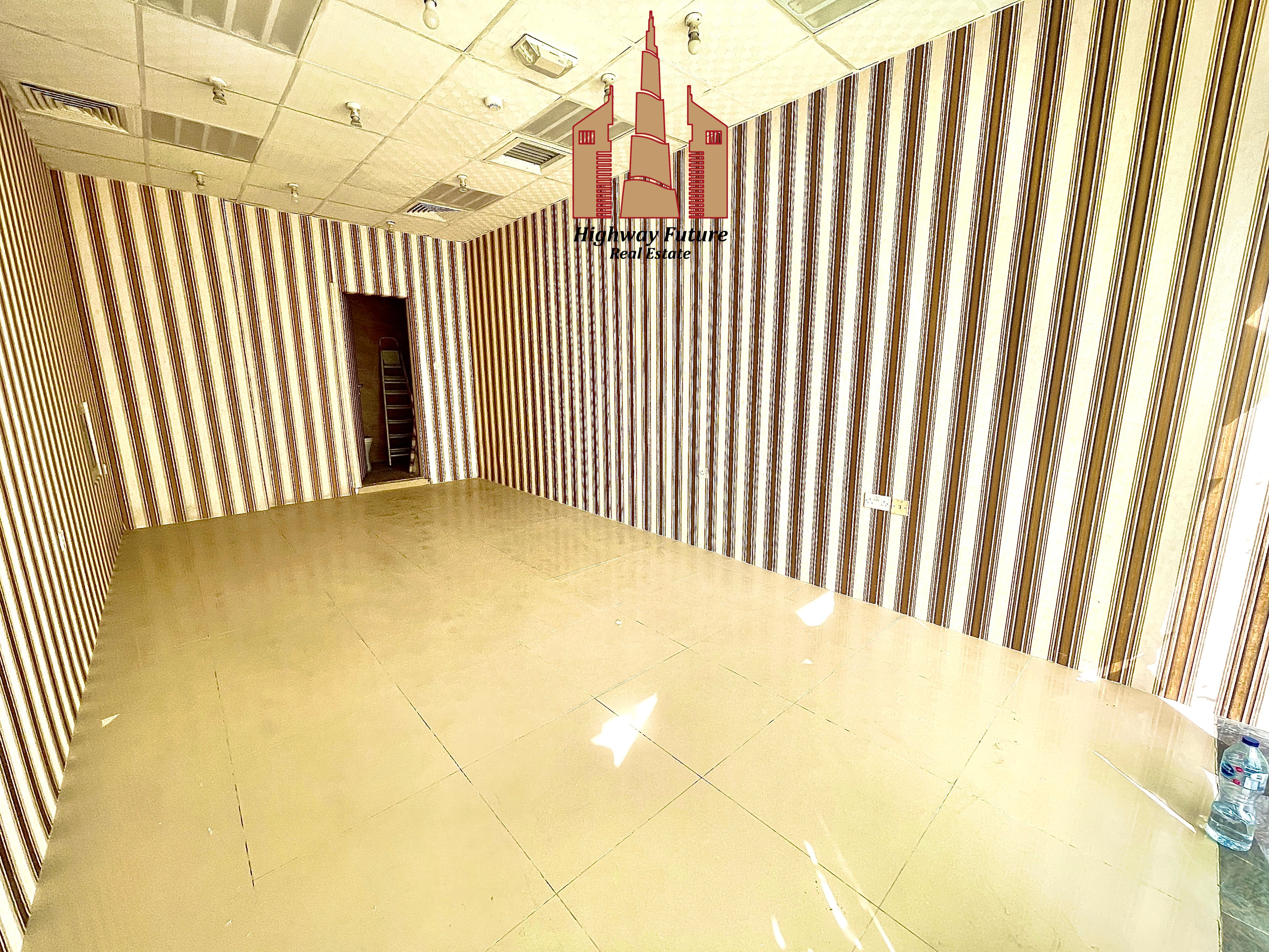 Spacious shop for Rent in new Muwaileh with on bath and central AC 20k