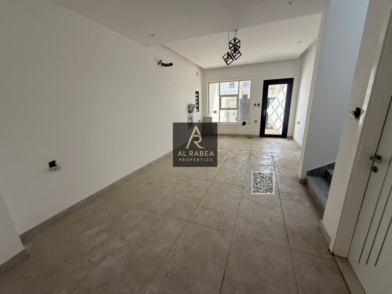 **English Translation:** A distinctive townhouse for sale in **Al Yasmeen**, an ideal option for family living or investment in a quiet area close to