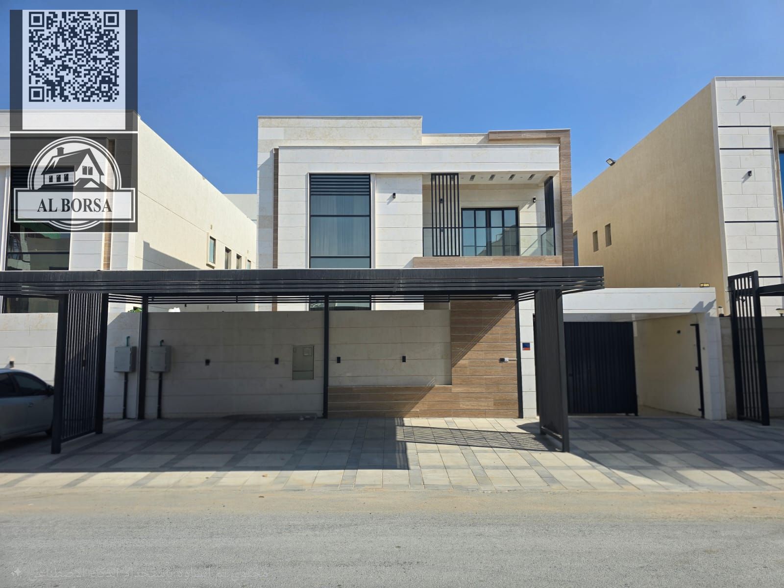 For rent: Brand new villa in Al Yasmin, 5 master bedrooms, living room, kitchen, maid's room, large yard, carport, and central air conditioning.