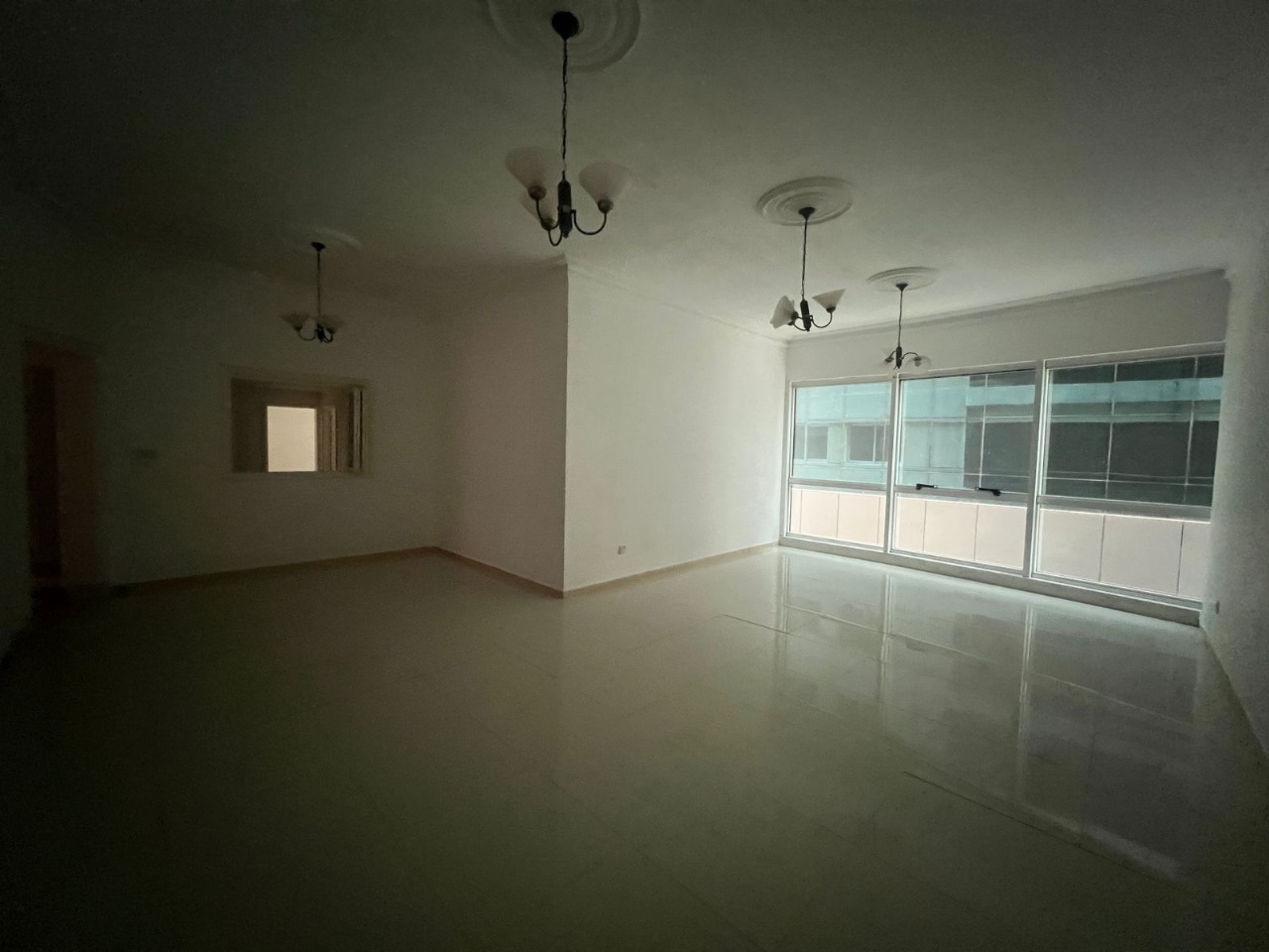 Free parking and free air conditioning on Al Buhaira Corniche, with a maid’s room and private bathroom, in an upscale family tower in Al Majaz.