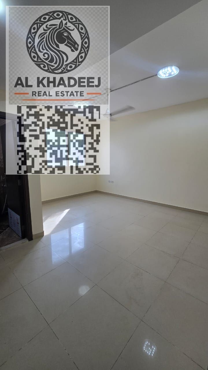A distinctive studio apartment for annual rent, spacious with a separate kitchen, in Al Jurf Industrial Area 2.