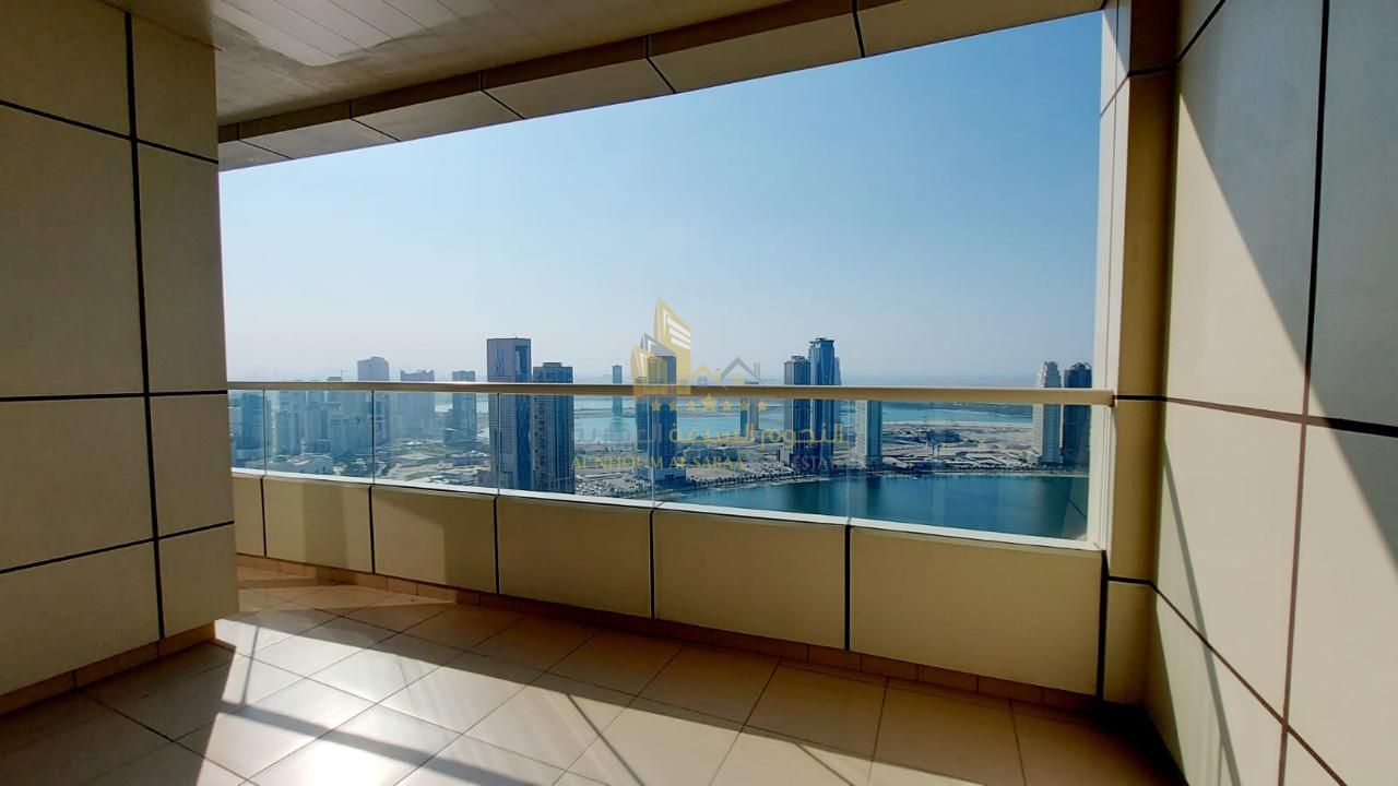 For sale: Two-bedroom apartment with a living room in Asas Tower. Spacious, with a full view of Khan Lake, including a maid's room and parking space.