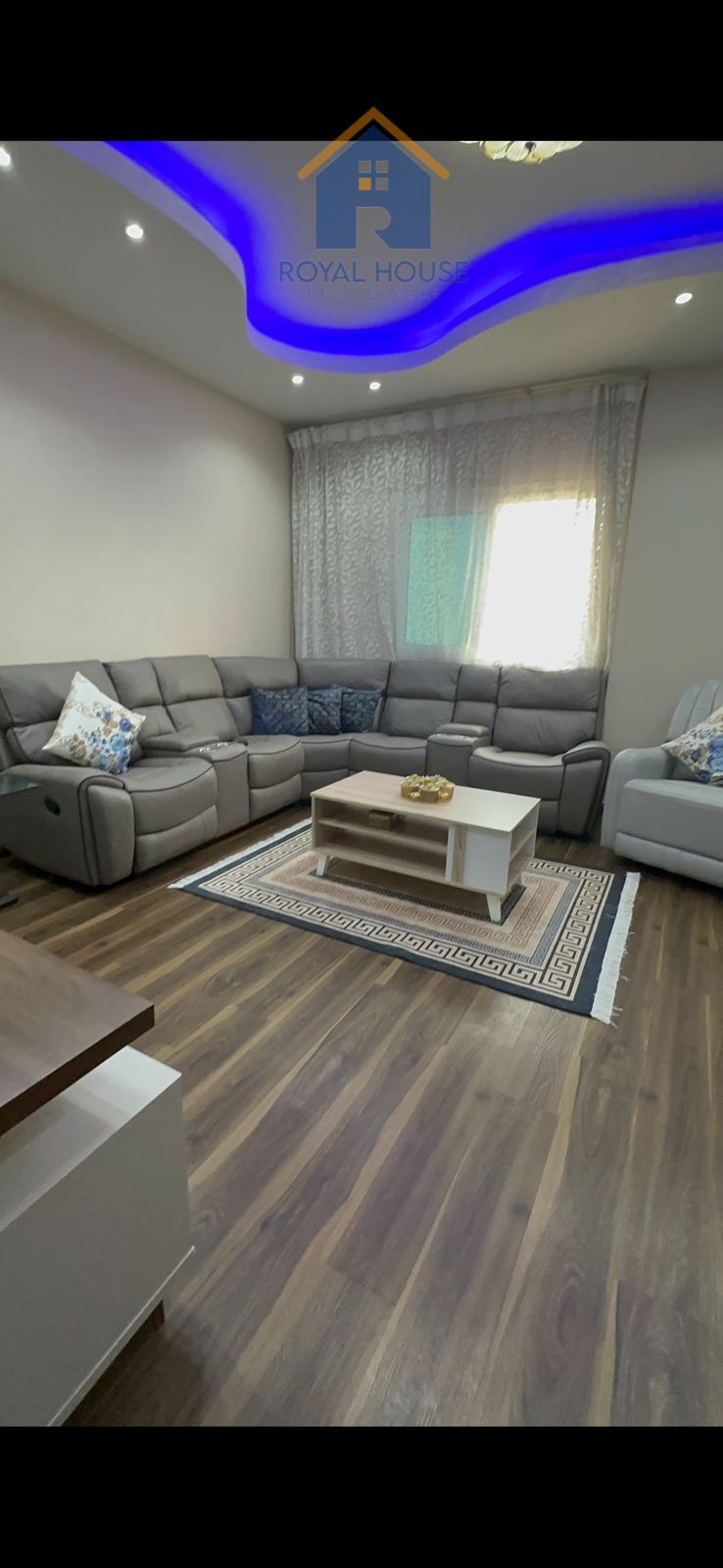 Two bedrooms and a living room with a parking space for sale in Al Qasba