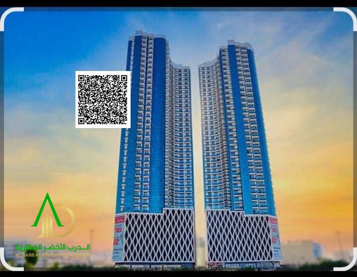 Own an elegant luxury 2BHK hall apartment with breathtaking open views and easy monthly installments at Oasis Tower 3, Al Rashidiya 1, Ajman.