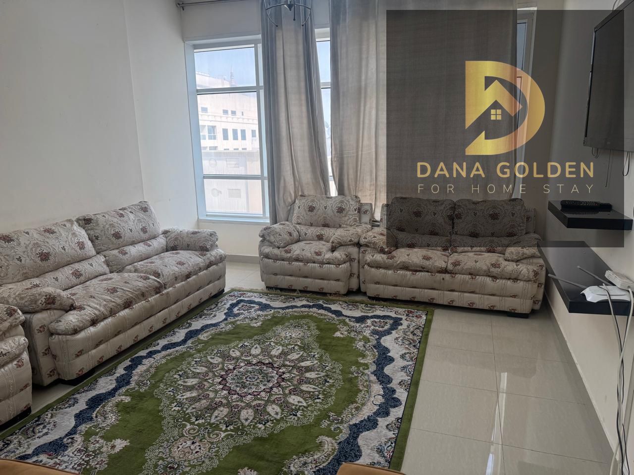Two-bedroom apartment with a living room for rent in Al Taawun