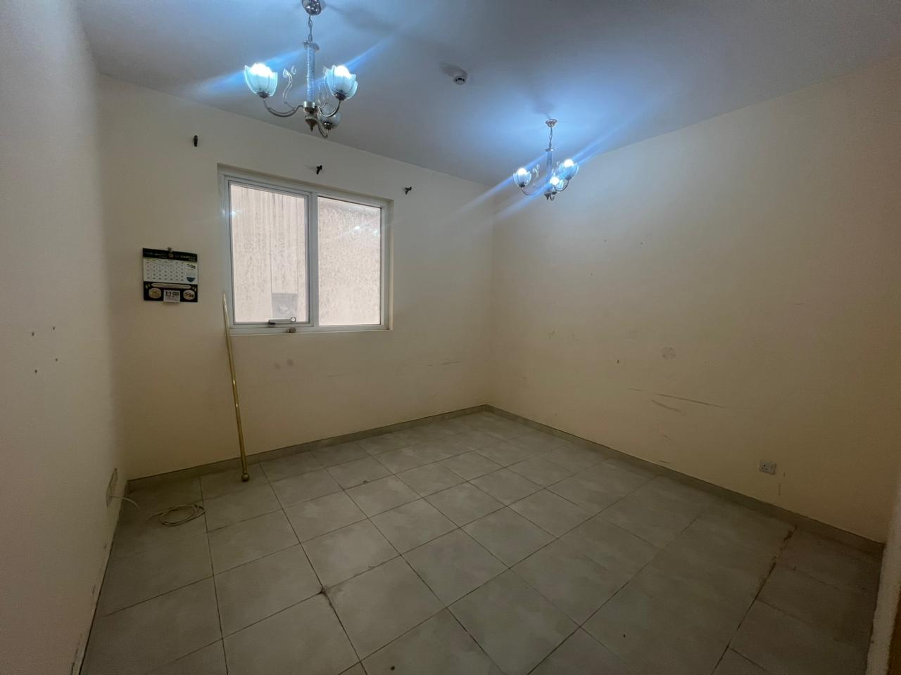 One bedroom and living room | Prime location | Central air conditioning | Close to Dubai exit | Free maintenance | Close to daily services