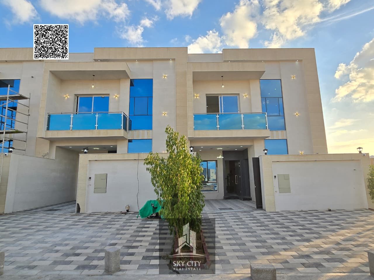 For sale near Al-Safeer Mall and next to the mosque: ground floor, first floor, and roof. Prime location. Registration fees included.