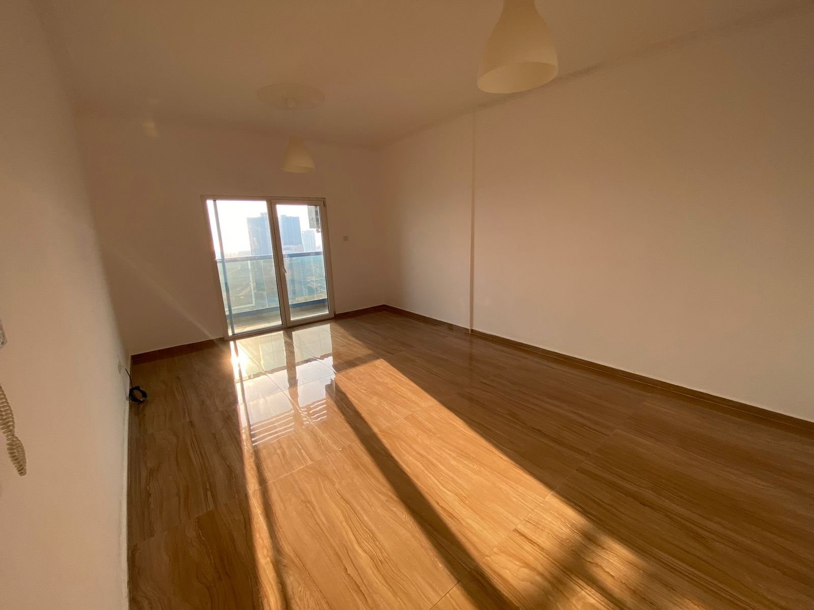 One bedroom and living room apartment in Al Nuaimiya 3, behind Mashreq Bank, near Sharjah and Dubai exits with private parking insi