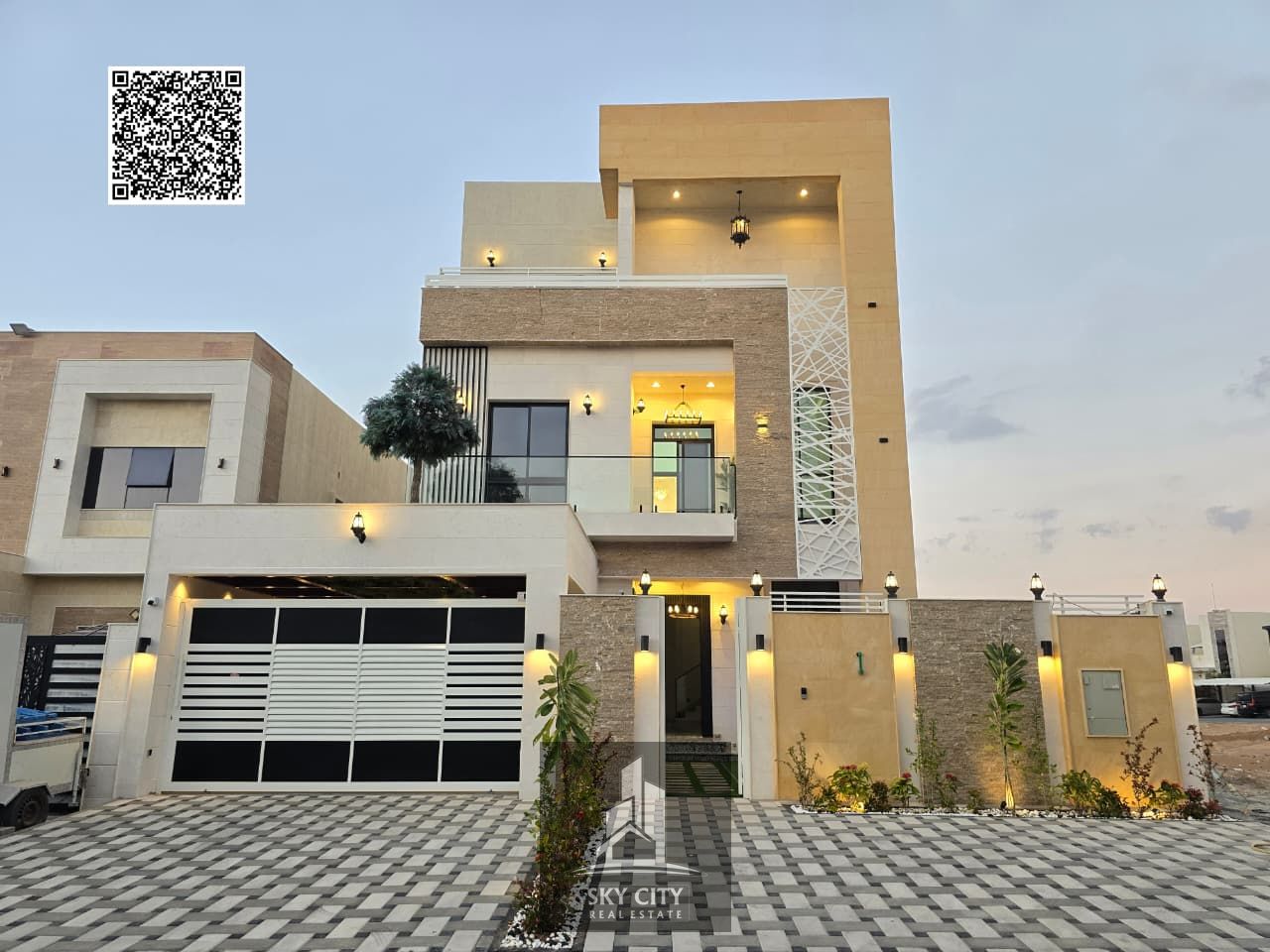 For sale: A luxurious modern villa with high-end finishes, located next to the mosque. The price includes registration and ownership fees, a swimming