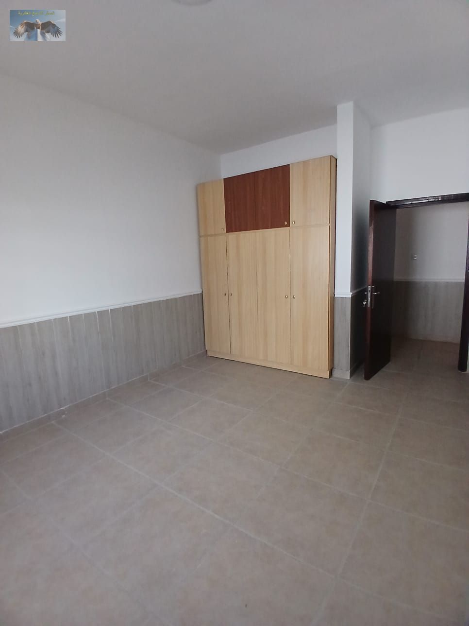 One bedroom apartment for rent in Al Rawda 2 Ajman spacious layout with built-in wardrobes near Layali Beirut Restaurant prime family area