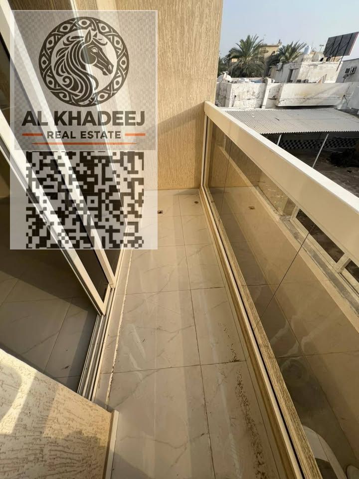 A spacious one-bedroom apartment with a balcony and a view, located in Al Nuaimiya 3, near Safeer Mall and Khalifa Street.