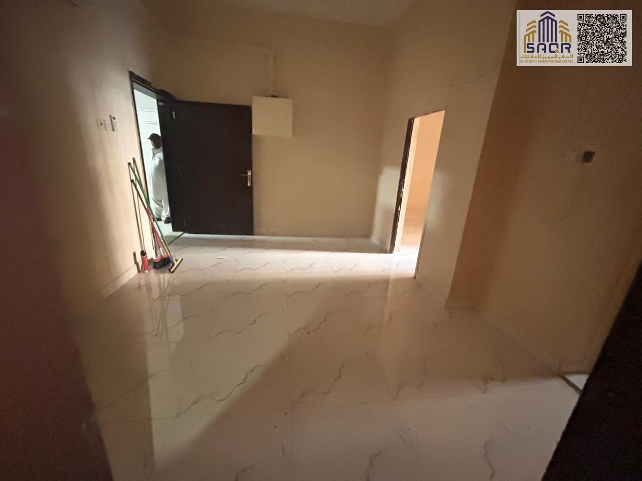 Apartment for rent in Al Hamidiya with two bedrooms separate living room hallway two bathrooms and balcony near services