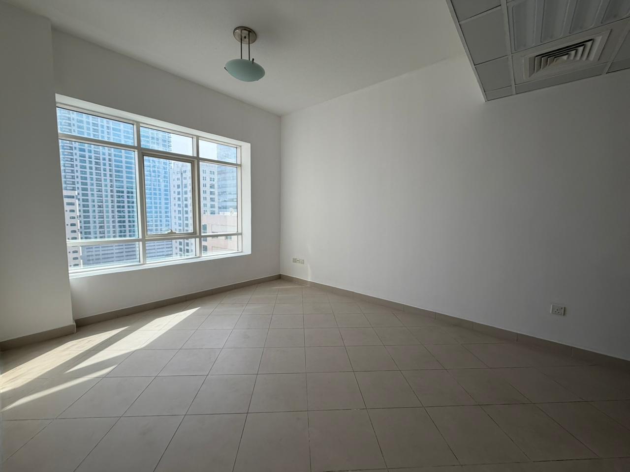 1BHK | Open View | 2 Baths | Spacious Kitchen | Built-in Wardrobes | Family Tower | Prime Location | 4 Cheques | Free Maintenance | Near Dubai Exit