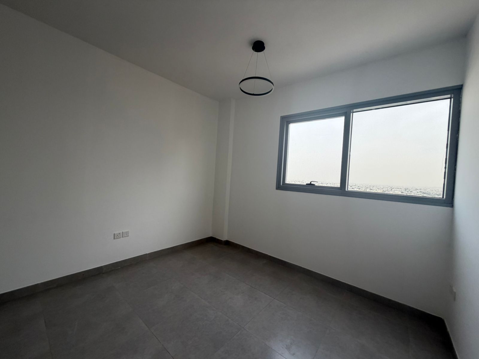 Second apartment with built-in wardrobes, central air conditioning, and a spacious kitchen with large areas.
