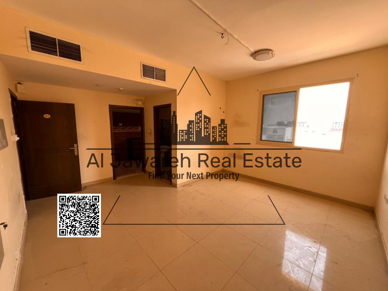 For annual rent, a well-located studio in Ajman, Al Jurf 2, Code 2120, with a total area of 540 sq. ft. and a separate fully equipped kitchen.