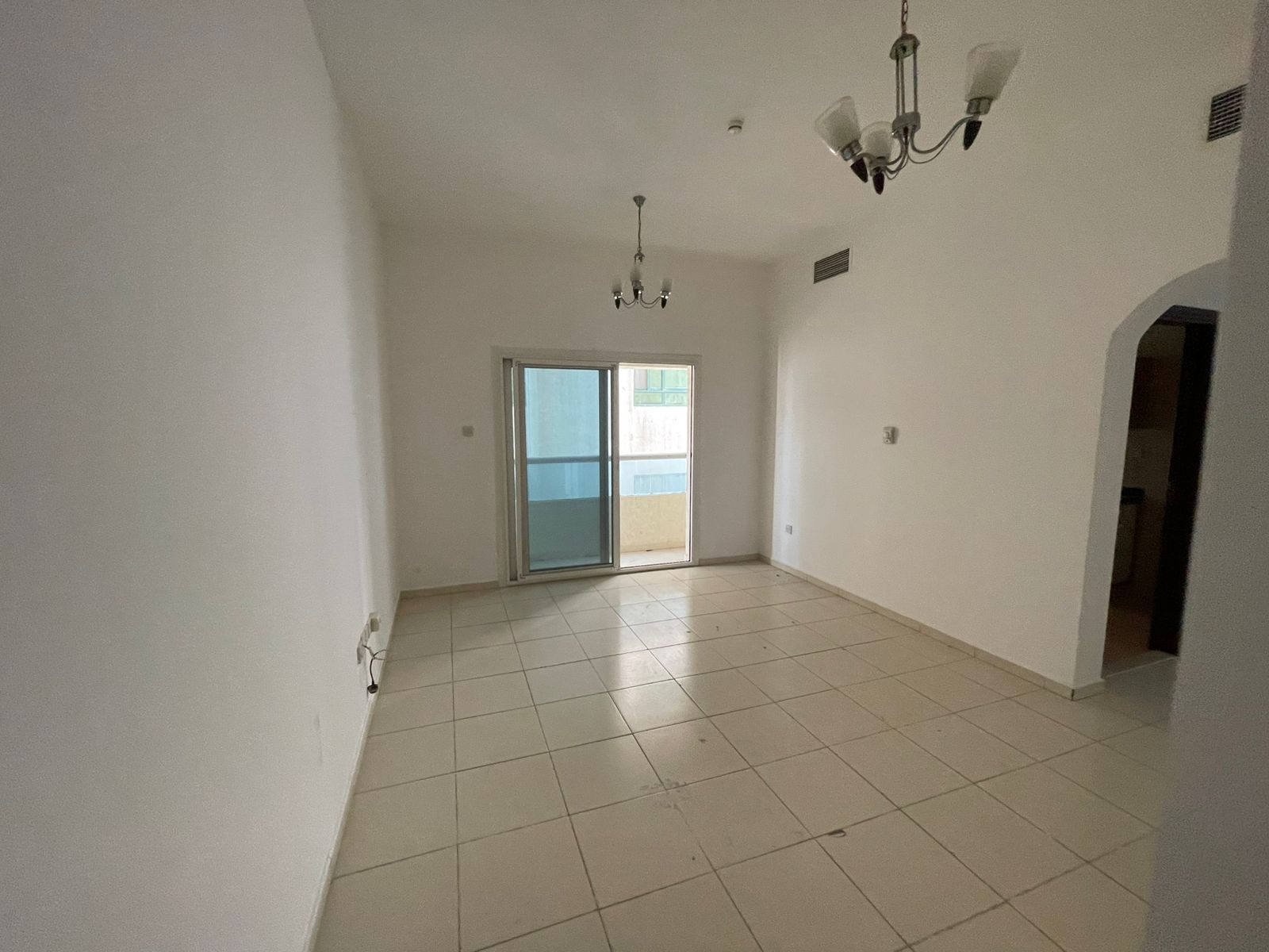 The most beautiful 1-bedroom apartment with a living room in Al Majaz 3, featuring a balcony with open view and energy-saving central air conditioning