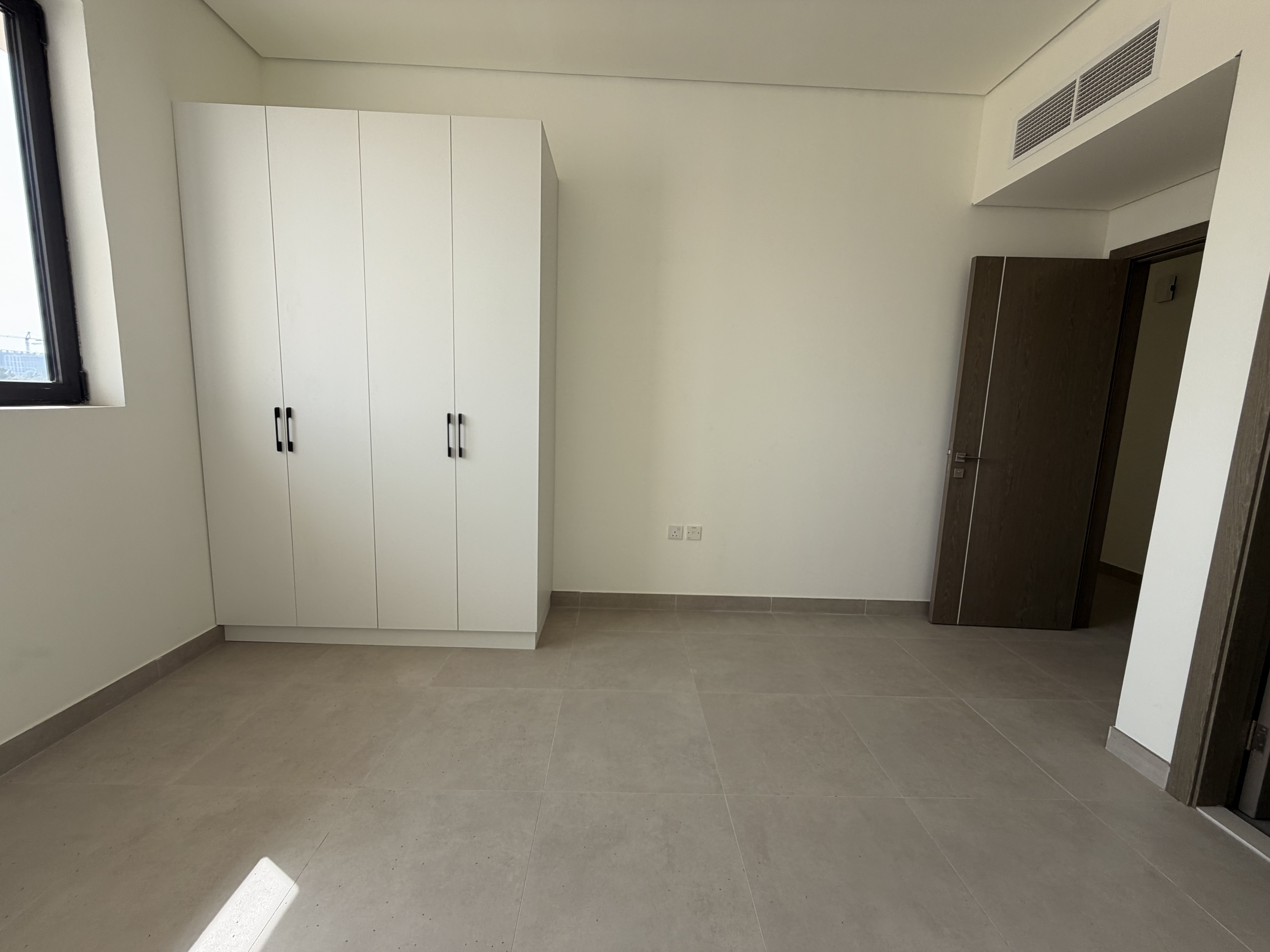 Brand New and Luxurious 1bhk apartment with 2 washroom and cupboards installed with large sized Balcony at the prime location of Al Jada