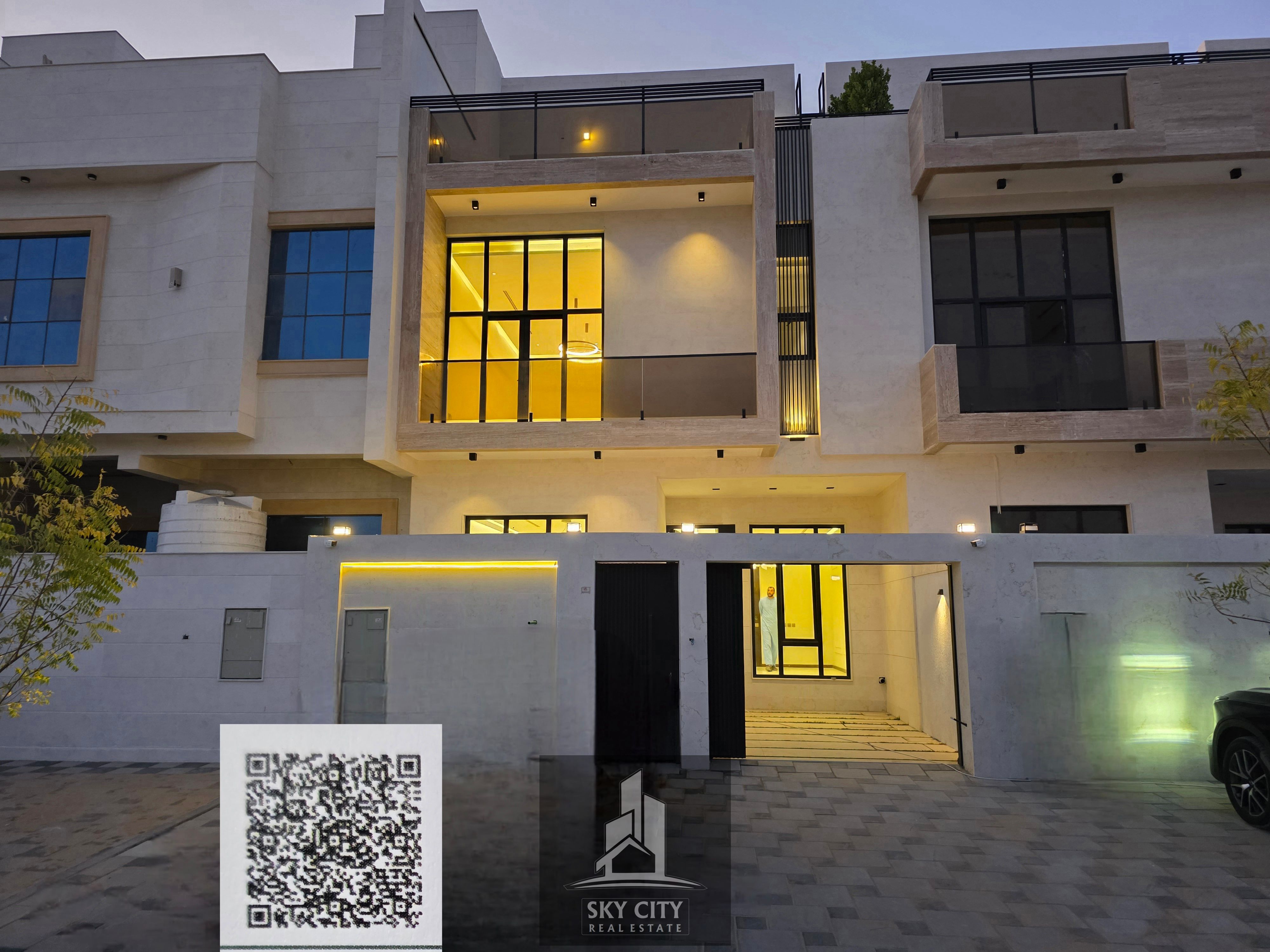 Al Yasmin, opposite Al Rahmaniya and Sharjah Sustainable City. Ground floor, first floor, and roof. Central air conditioning included. Registration and ownership fees included. Freehold ownership for all nationalities. Near Al Hamidiya Park.