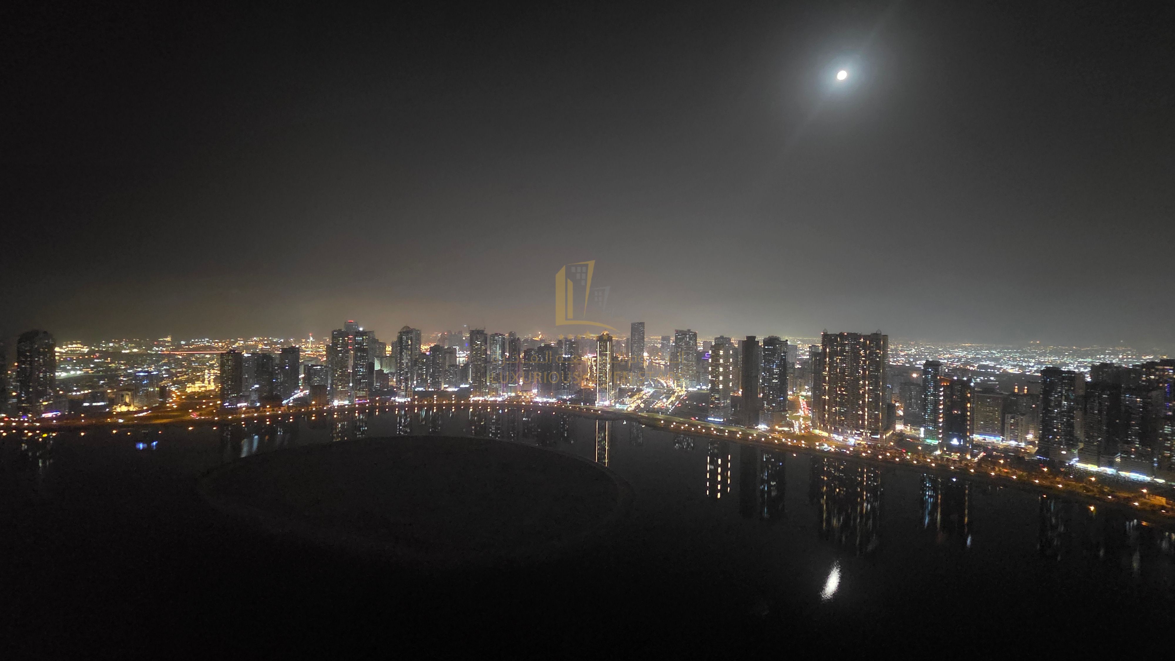 Distinctive apartment with a full sea view overlooking Al Khan Lake from the living room and kitchen.
