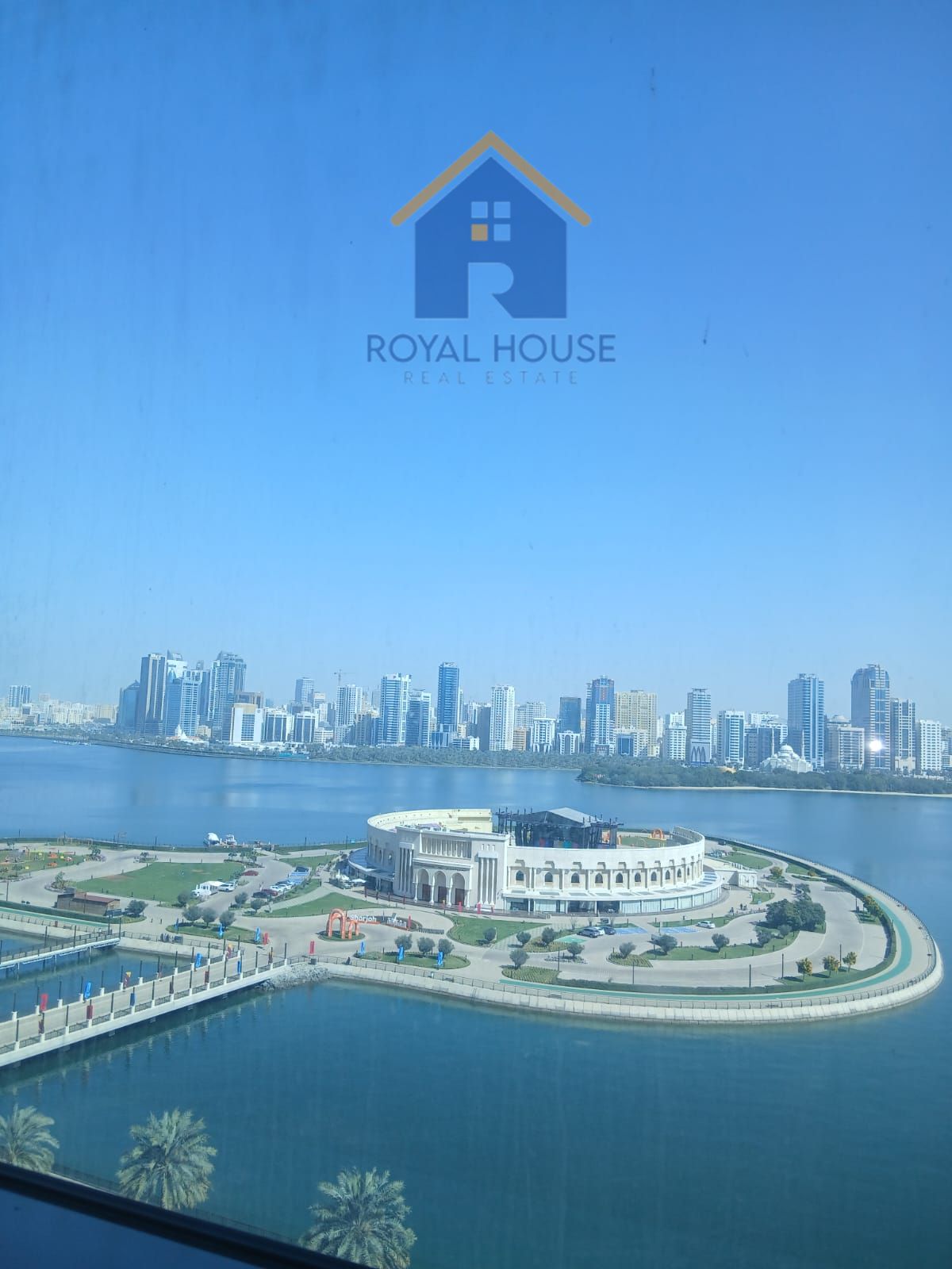 2 BR Oasis in Al Dana Tower: Stunning Water Views
