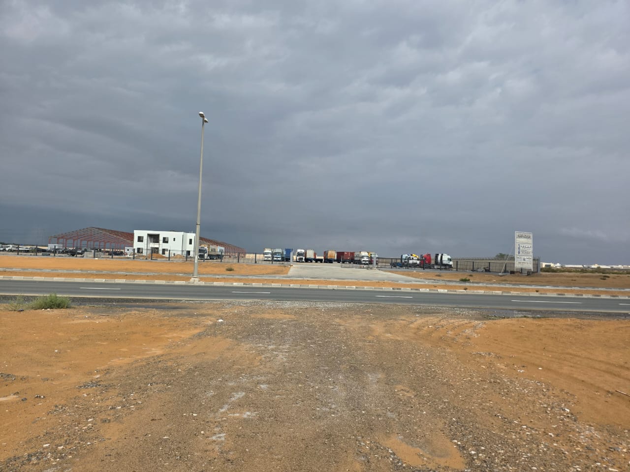 Investment Alert: 8,000 Sq. Ft. Yard on Main Road with AED 150K Expected Income.