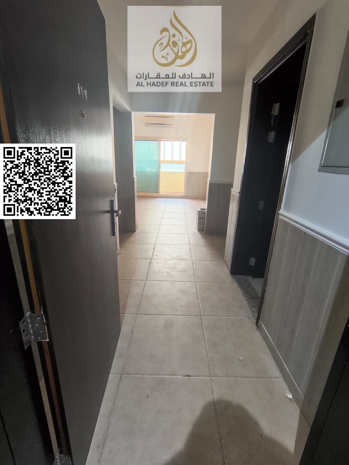 A large room and living room with a laundry room and balcony in Rawda 2