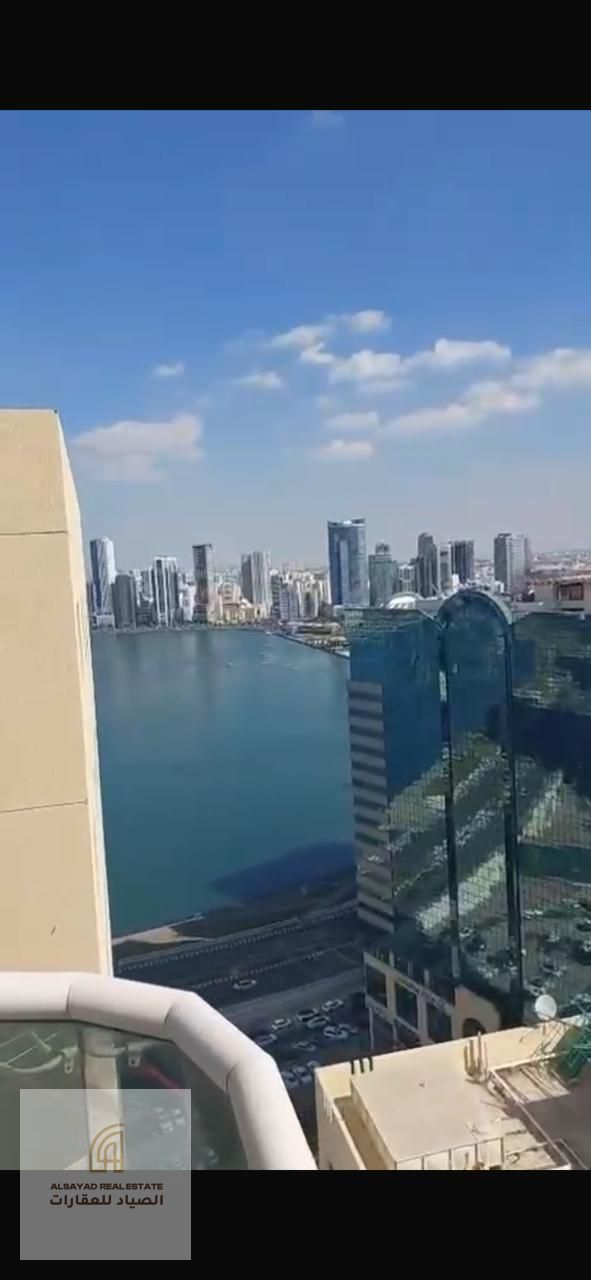 Two-Bedroom Apartment with Living Room and Parking for Sale in Al Qasba