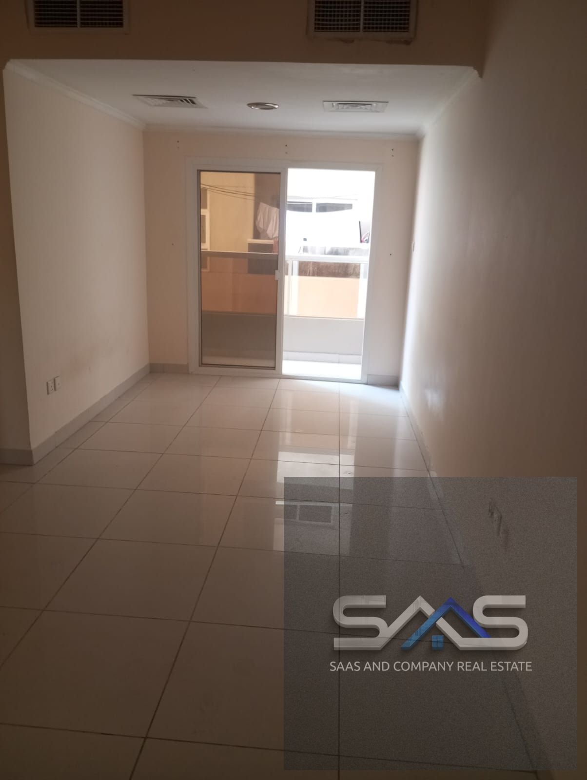 Annual rental opportunity: Two-bedroom apartment with a living room, suitable for families, in Al Nuaimiya 1
