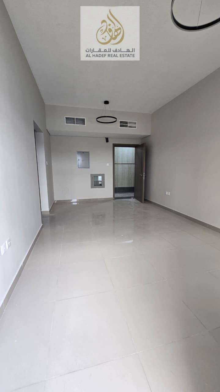 Al Jurf 3 on Mohammed Bin Zayed Road, near the Chinese Market - First occupancy, one bedroom, living room, two bathrooms with balcony - Excellent fini