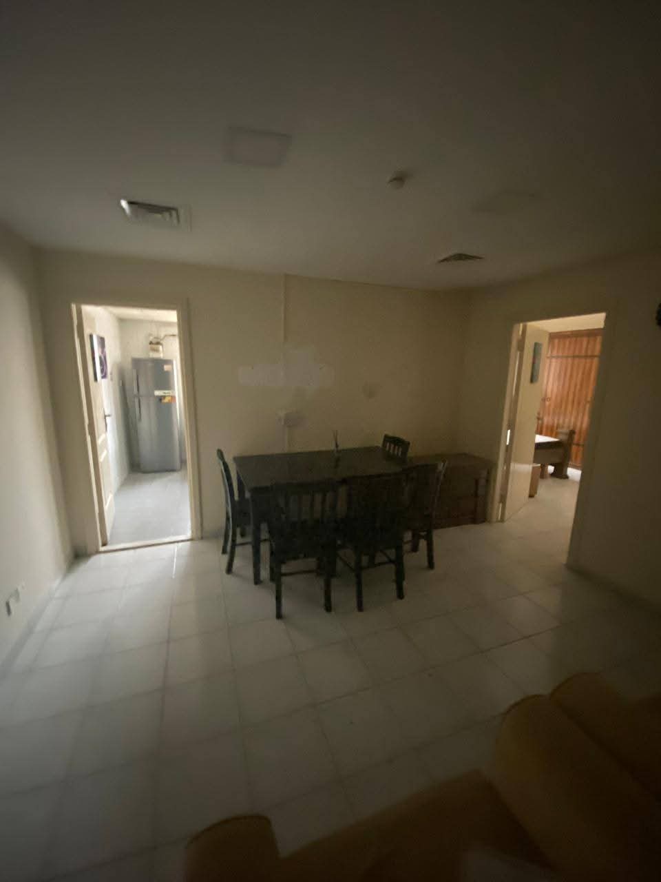 Spacious one-bedroom apartment with living room and open view, in a vibrant prime location close to cafés, shops, all services, and near the Dubai exi