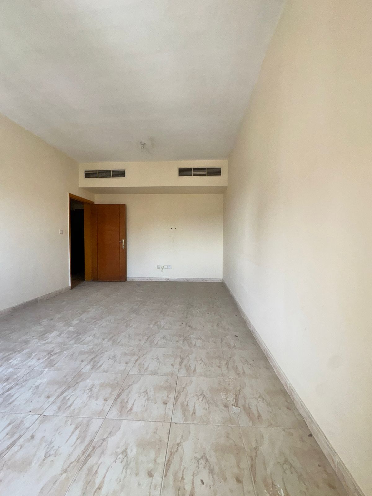 One bedroom, living room, bathroom, balcony, spacious area in Al Rashidiya 3, excellent location, all services available, first occupancy after renova