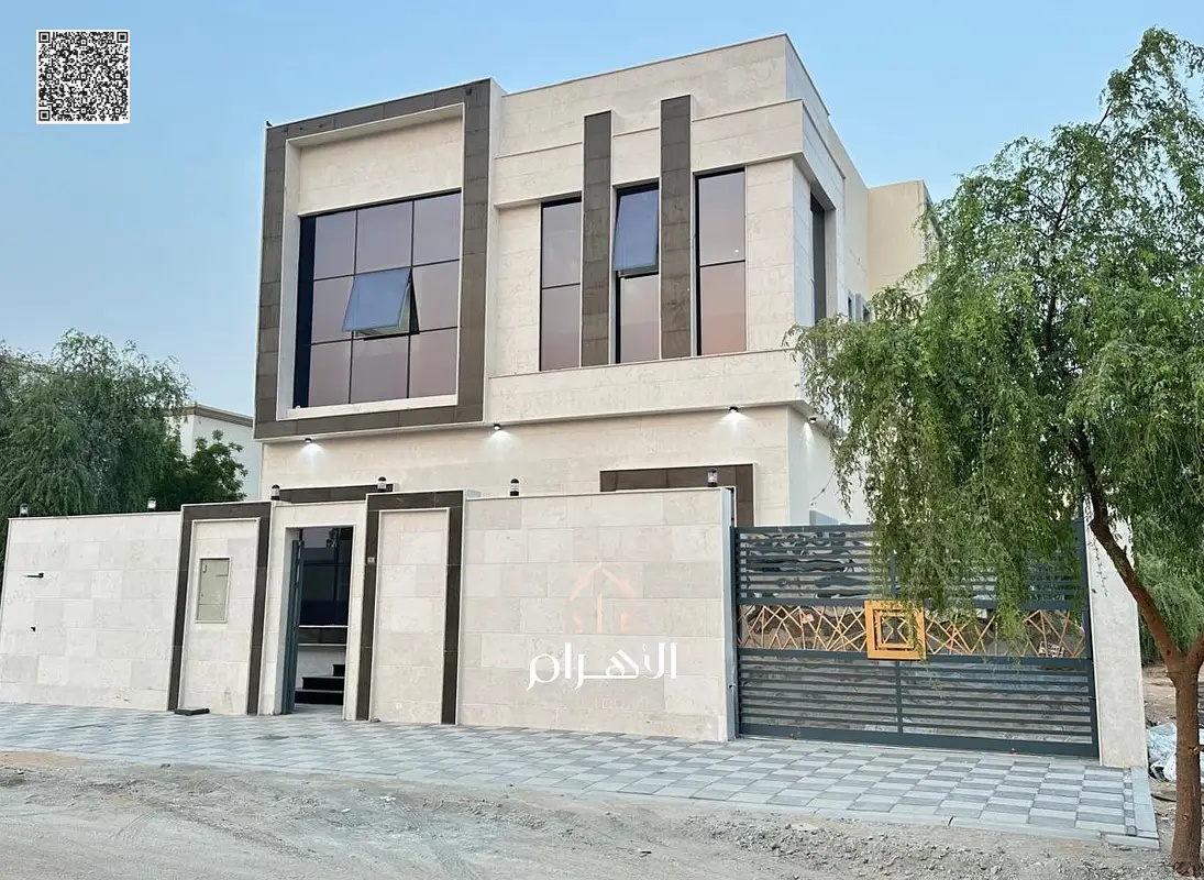 Luxury villa in Al Helio 2, Ajman, ready for immediate occupancy with high-end finishes and spacious living areas. Freehold ownership for all national