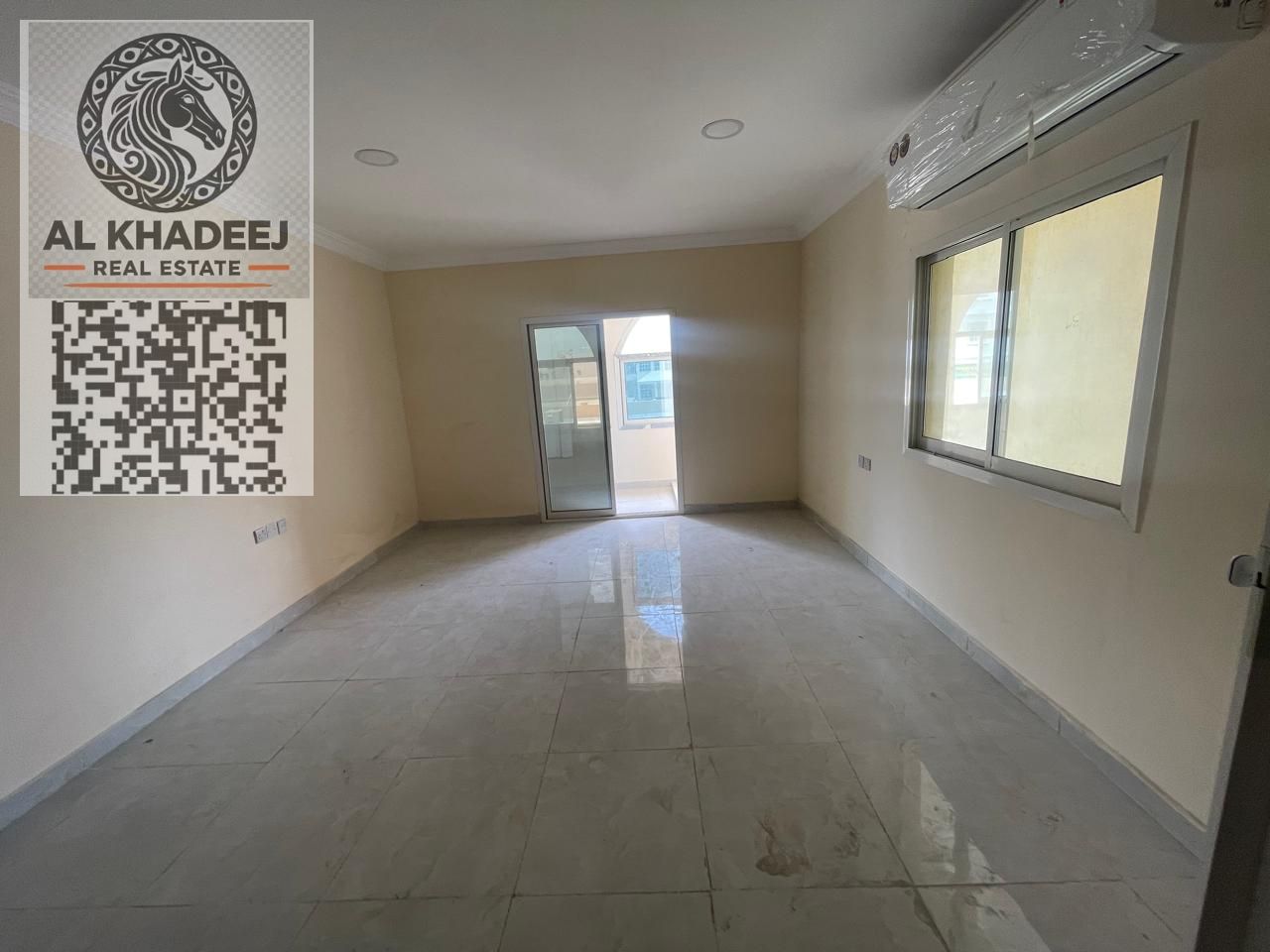 One bedroom and living room with balcony and a view, first occupancy, in Al Rawda 3 area, close to all services and the Dubai and Sharjah exit.