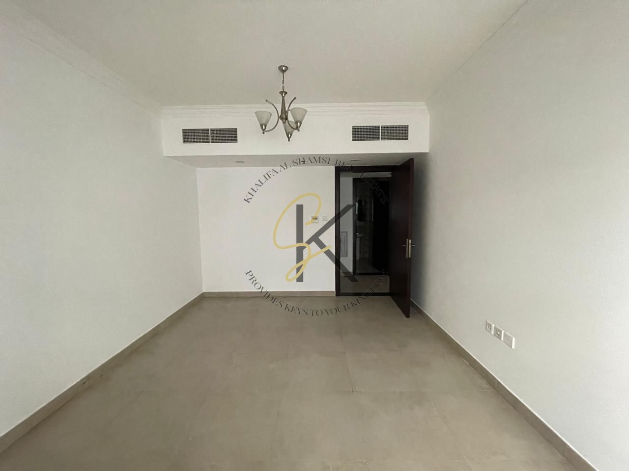 Extra-Spacious Unfurnished 2 BHK Apartment with Dedicated Parking for Rent in Muwailah Commercial, Sharjah | 1350 Sqft | All Amenities | Prime Location