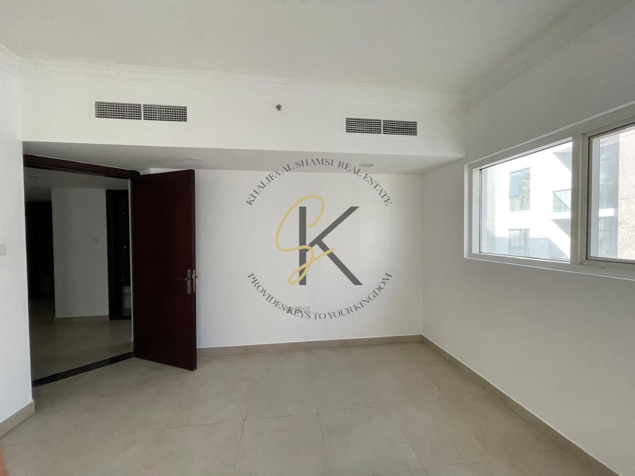 Extra-Spacious Unfurnished 2 BHK Apartment with Dedicated Parking for Rent in Muwailah Commercial, Sharjah | 1350 Sqft | All Amenities | Prime Location