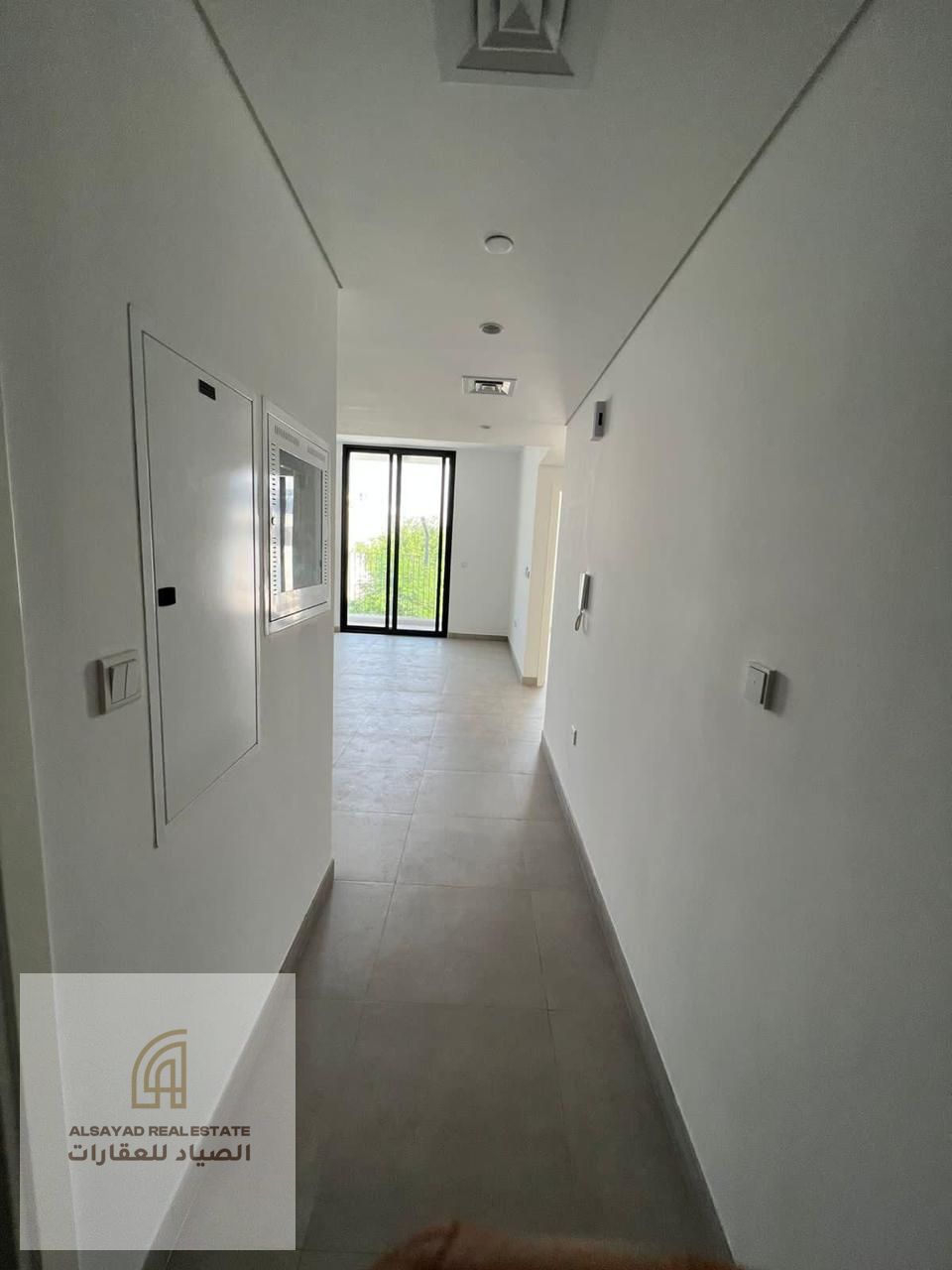 For sale: A very special apartment in Aljada, Sharjah, consisting of two bedrooms, a living room, a large terrace, and parking.