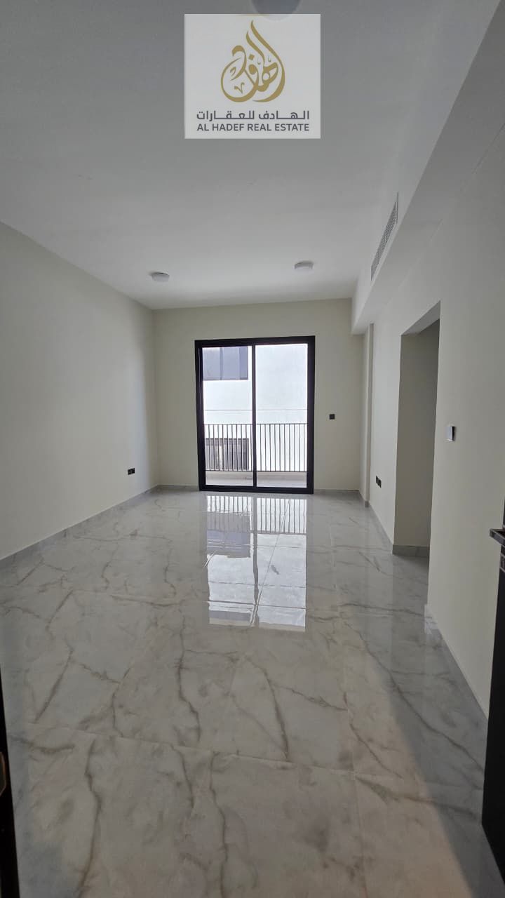 For annual rent A distinctive one-bedroom apartment with a living room, two bathrooms , and a spacious balcony , located in Al Jurf 3 on a vi