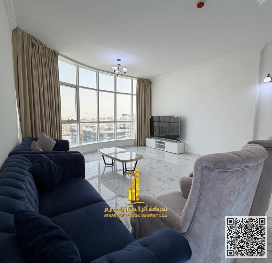 Luxury VIP Apartment Two bedrooms, living room, balcony with sea view, fully furnished, for monthly rent in Ajman, Oasis Tower. Includes utilities