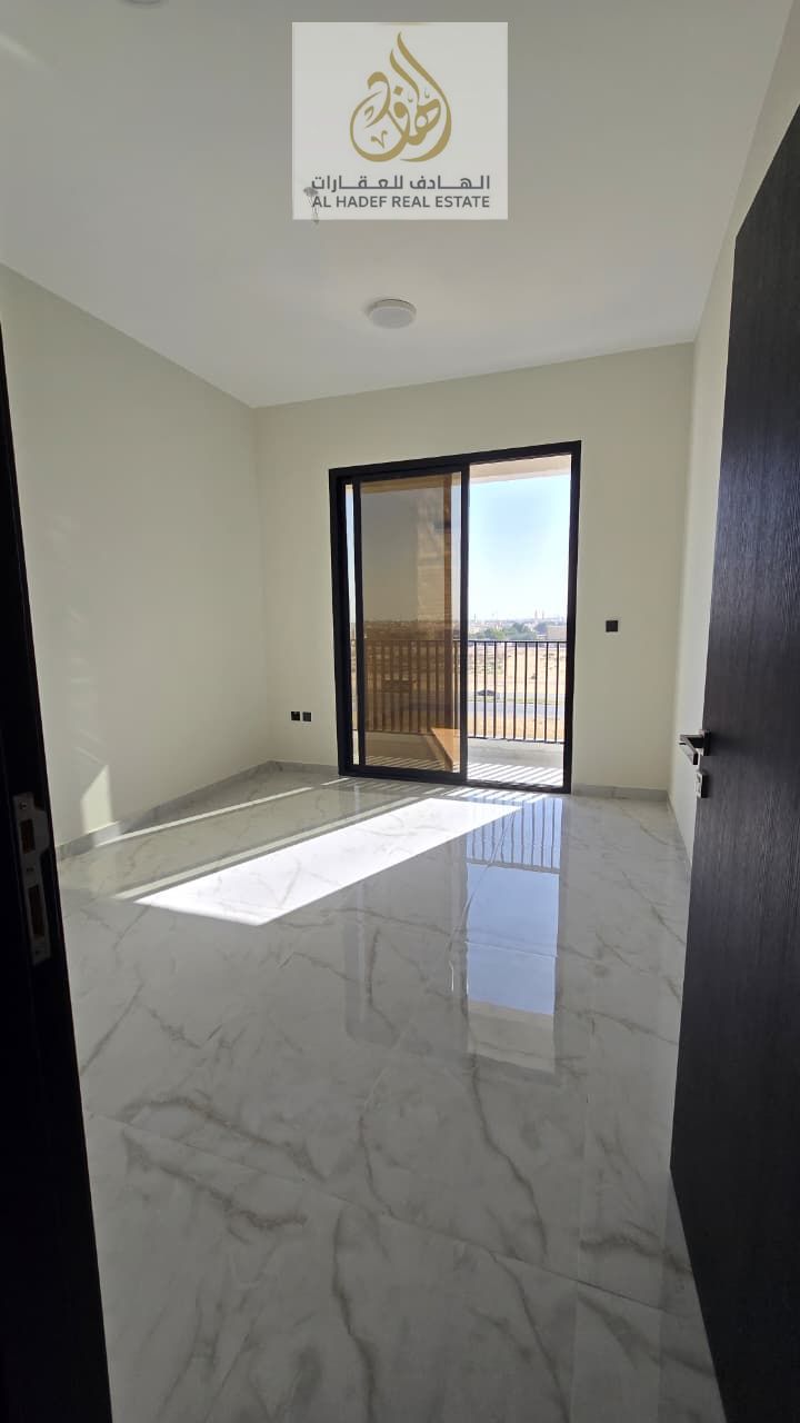 For annual rent A distinctive one-bedroom apartment with a living room, two bathrooms , and a spacious balcony , located in Al Jurf 3 on a vi